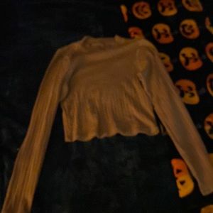 A light brown cropped sweater